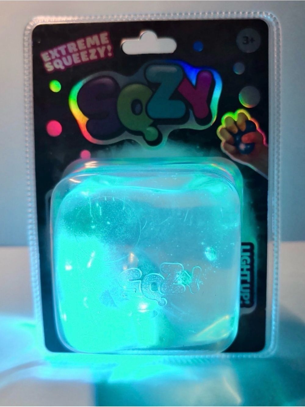 SQZY- light-up squishy toy. Soft, squeezable design for tactile play
